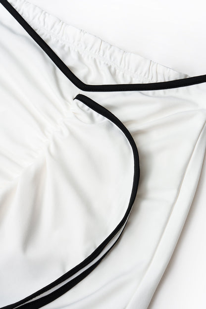 Conjunto Halter Cut-Out y Falda Sirena – Blanco y Negro