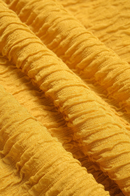 Top Amarillo Texturizado con Tirantes de Bolas